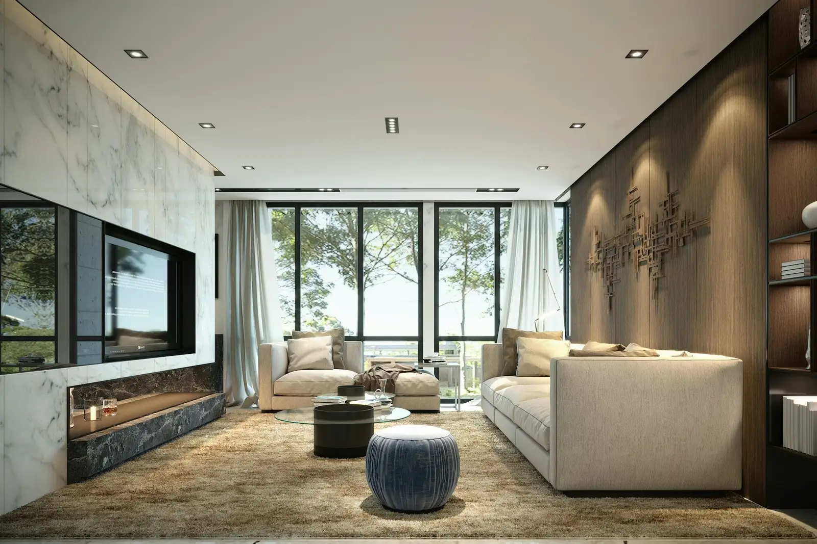 Living room with a marble feature wall, cream sofas and tall windows